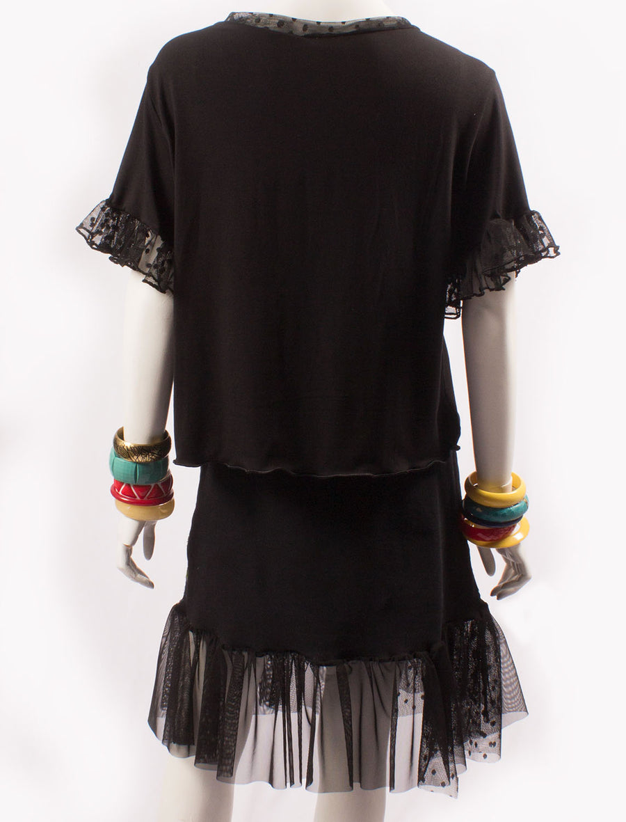 JUPE NOIRE EN “A” BRODERIES SYMÉTRIQUES