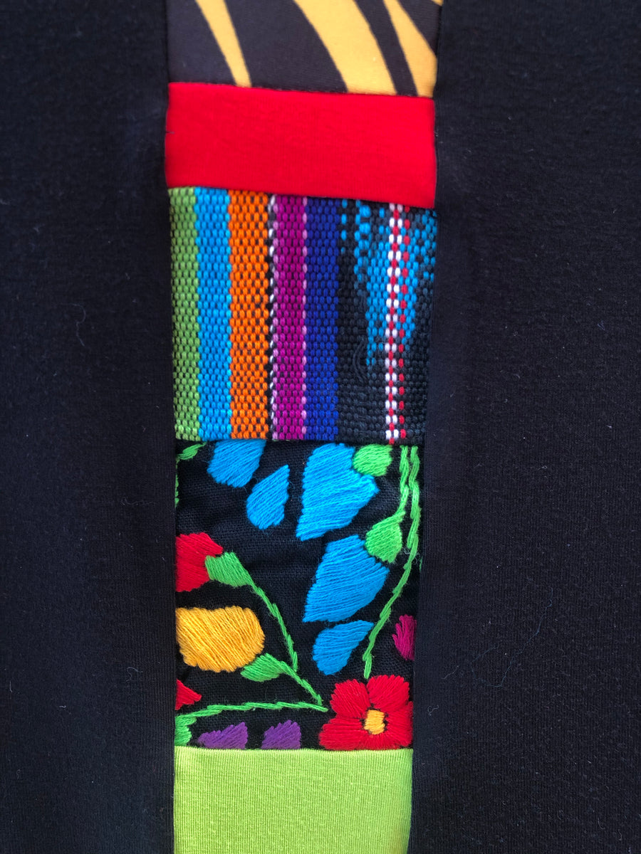 BLACK TOP THAT TIES AT THE WAIST WITH MIXED FABRIC BAND AT THE FRONT