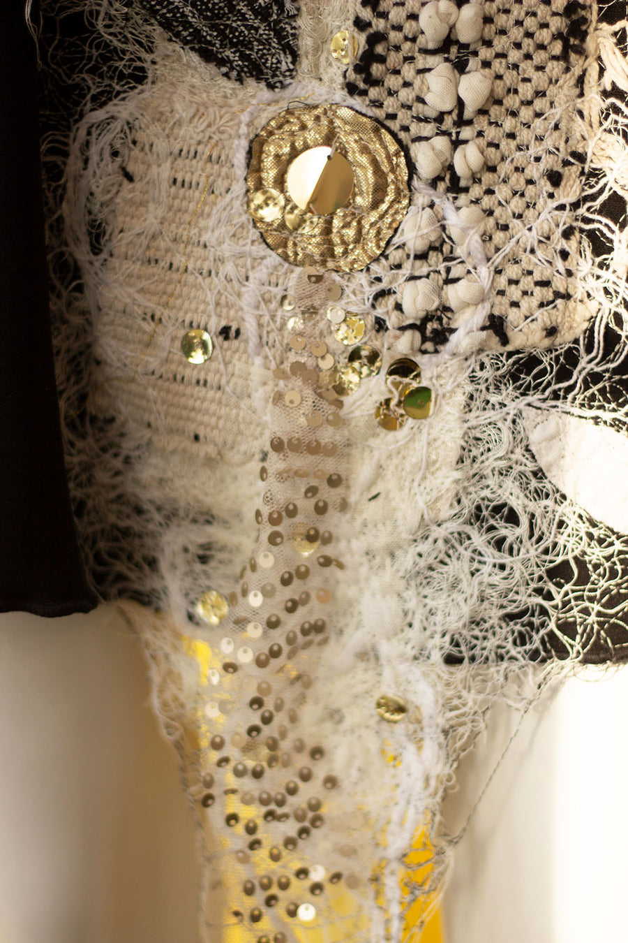 ROUND BLACK SKIRT WITH WHITE EMBROIDERY