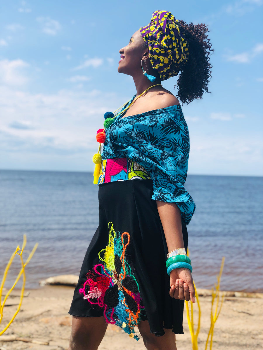 ROUND BLACK SKIRT WITH BRIGHT COLOR EMBROIDERY
